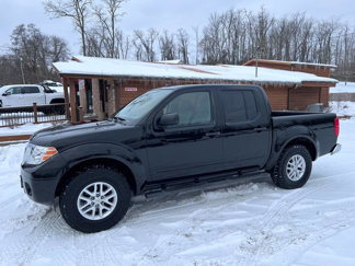 Used 2014 Nissan Frontier SV image 1
