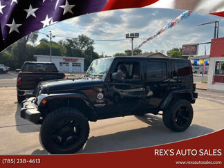 Used 2012 Jeep Wrangler Unlimited Sahara w/ Dual Top Group image 1