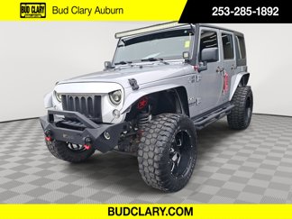 Used 2016 Jeep Wrangler Unlimited Sahara image 1