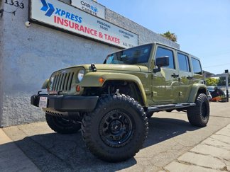 Used 2013 Jeep Wrangler Unlimited Sahara w/ Connectivity Group image 1