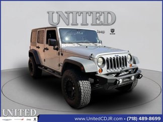 Used 2012 Jeep Wrangler Unlimited Sport image 1