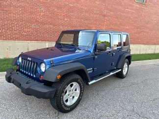 Used 2010 Jeep Wrangler Unlimited Sport image 1