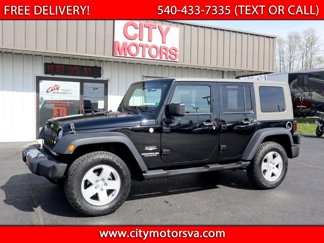 Used 2010 Jeep Wrangler Unlimited Sahara w/ Dual Top Group image 1