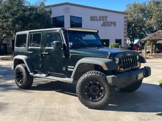 Used 2012 Jeep Wrangler Unlimited Sport image 1