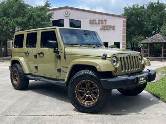 Used 2013 Jeep Wrangler Unlimited Sahara w/ Dual Top Group image 1