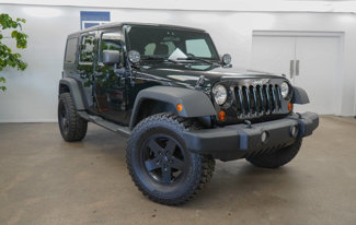 Used 2012 Jeep Wrangler Unlimited Sport image 1