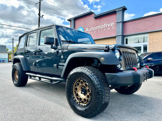 Used 2018 Jeep Wrangler Unlimited Sport image 1