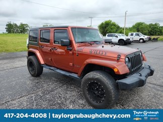 Used 2014 Jeep Wrangler Unlimited Sahara w/ Max Tow Package image 1