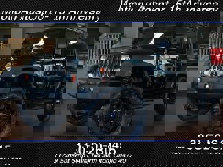 Used 2013 Jeep Wrangler Unlimited Sport w/ Mopar Black Appearance Group image 1