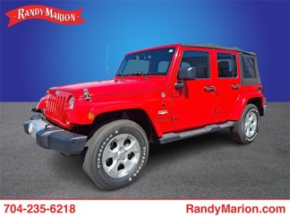 Used 2014 Jeep Wrangler Unlimited Sahara w/ Dual Top Group image 1