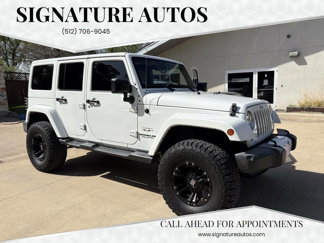 Used 2016 Jeep Wrangler Unlimited Sahara w/ Connectivity Group image 1