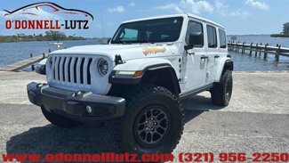 Used 2023 Jeep Wrangler Unlimited Jeep Beach 20th w/ Xtreme 35 Tire Package image 1