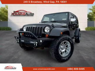 Used 2013 Jeep Wrangler Unlimited Sport image 1