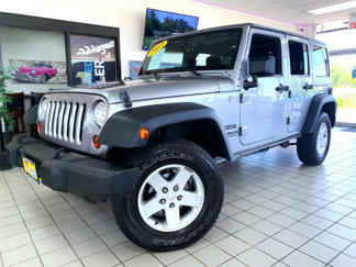 Used 2013 Jeep Wrangler Unlimited Sport image 1