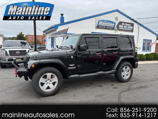 Used 2011 Jeep Wrangler Unlimited Sahara w/ Dual Top Group image 1