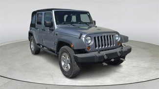 Used 2013 Jeep Wrangler Unlimited Sport image 1