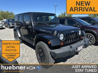 Used 2012 Jeep Wrangler Unlimited Rubicon w/ Dual Top Group image 1