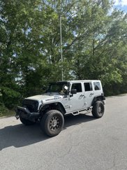 Used 2011 Jeep Wrangler Unlimited Sport image 1