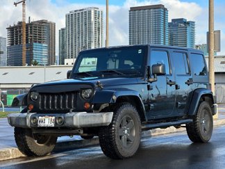 Used 2013 Jeep Wrangler Unlimited Sport image 1