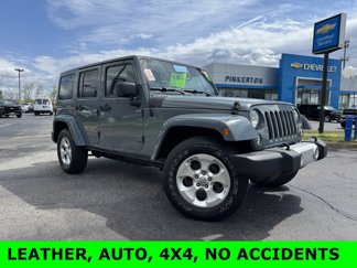 Used 2015 Jeep Wrangler Unlimited Sahara w/ Dual Top Group image 1