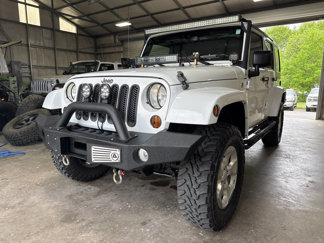 Used 2013 Jeep Wrangler Unlimited Sahara w/ Dual Top Group image 1