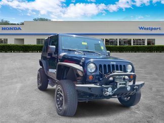 Used 2013 Jeep Wrangler Sport image 1