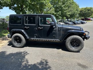 Used 2012 Jeep Wrangler Unlimited Rubicon w/ Dual Top Group image 1