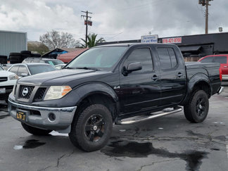 Used 2010 Nissan Frontier SE image 1