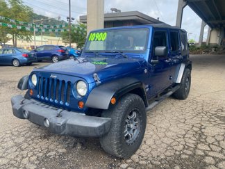 Used 2010 Jeep Wrangler Unlimited Sport image 1