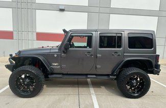 Used 2014 Jeep Wrangler Unlimited Sahara w/ Max Tow Package image 1