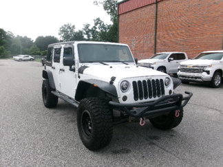 Used 2013 Jeep Wrangler Unlimited Sport image 1