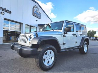 Used 2010 Jeep Wrangler Unlimited Sport image 1
