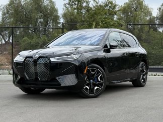 Used 2024 BMW iX xDrive50 w/ Sport Package image 1