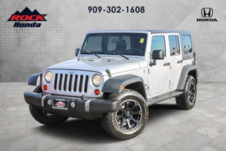 Used 2012 Jeep Wrangler Unlimited Sport image 1