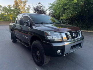 Used 2012 Nissan Titan SV w/ SV Premium Utility Pkg image 1