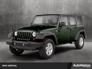 Used 2012 Jeep Wrangler Unlimited Sport image 1
