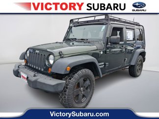 Used 2010 Jeep Wrangler Unlimited Sport image 1