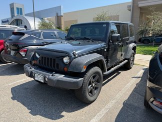 Used 2011 Jeep Wrangler Unlimited Sport image 1