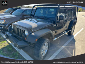 Used 2013 Jeep Wrangler Unlimited Sport image 1