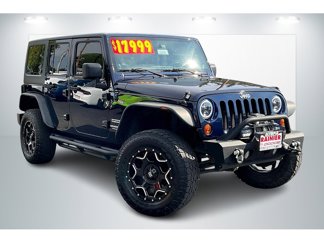Used 2013 Jeep Wrangler Unlimited Sport image 1