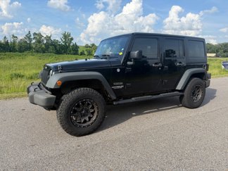 Used 2013 Jeep Wrangler Unlimited Sport image 1