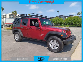 Used 2013 Jeep Wrangler Unlimited Sport image 1