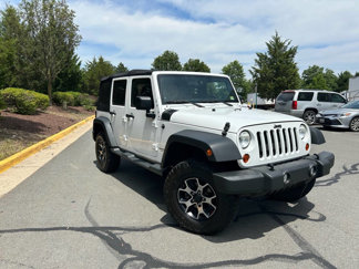 Used 2013 Jeep Wrangler Unlimited Sport image 1