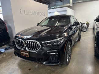 Used 2022 BMW X6 xDrive40i w/ M Sport Package image 1