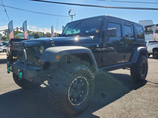 Used 2011 Jeep Wrangler Unlimited Sport image 1