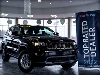 Used 2019 Jeep Grand Cherokee Laredo image 1