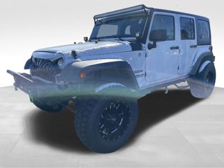 Used 2012 Jeep Wrangler Unlimited Sport image 1