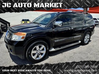 Used 2013 Nissan Armada Platinum image 1