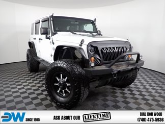 Used 2012 Jeep Wrangler Unlimited Sahara image 1