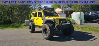 Used 2013 Jeep Wrangler Unlimited Sport image 1